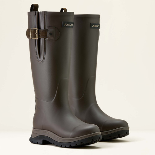 A pair of sturdy brown rubber boots with a buckle detail, labelled "Ariat." They feature thick, textured soles for grip. The tone is functional and robust.