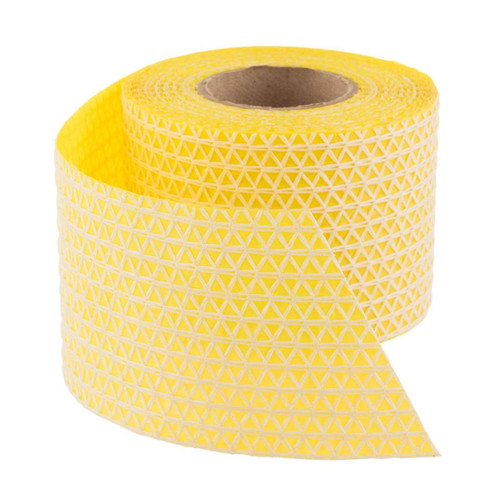 Yellow non-slip rug gripper tape with a triangular textured design, designed to hold rugs and mats securely on all floor surfaces.