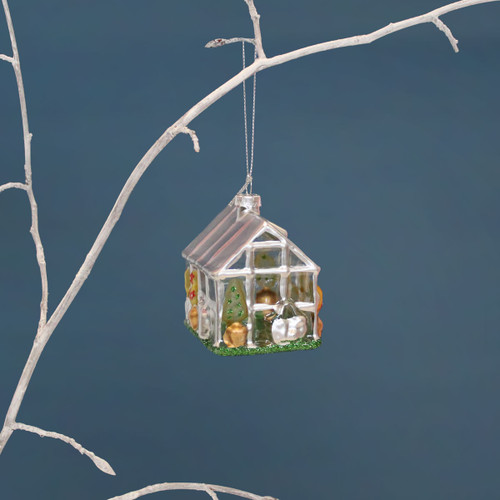 Silver greenhouse Christmas hanging decoration with clear panels, miniature plants and gardening accessories, finished with a green glitter base.