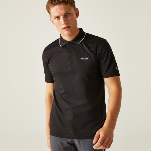 A front view of a man wearing a black Regatta polo shirt on a white background