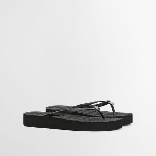 Black flip flops with slim thong straps and thick cushioned sole on a white background