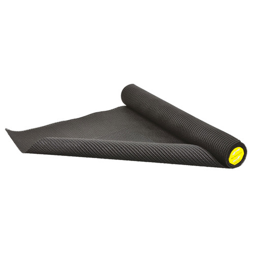 A black non-slip mat roll partially unrolled, revealing its textured surface. A yellow label is visible on one end, suggesting a brand or product information.