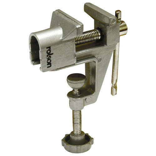 Silver metal vise clamp with a screw mechanism and a textured handle, designed for holding small objects securely during tasks like assembling or repairing.