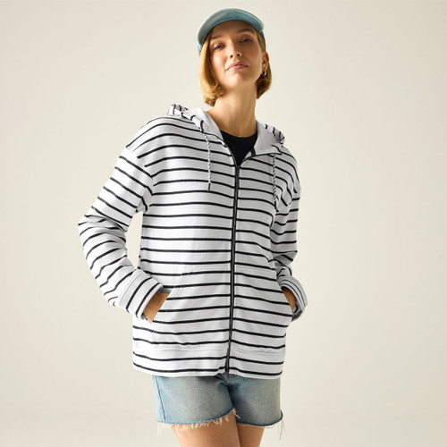 Model wearing a white zip-through hoodie with navy horizontal stripes, hands in pockets.