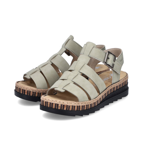 Pair of green strappy platform sandals with buckle fastening, shown in three-quarter view on a white background.