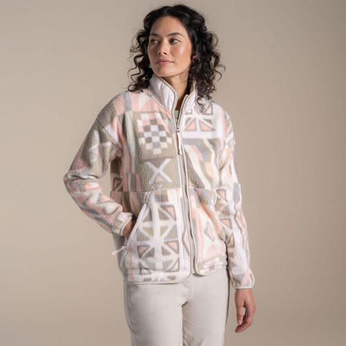 Model wearing pastel geometric print fleece jacket with full zip and high collar