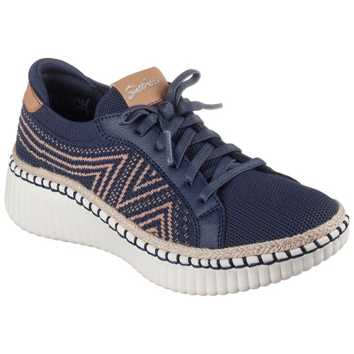 A navy trainer with zigzag peach patterns, white ribbed sole, and brown accents. The shoe has a casual, stylish design, perfect for everyday wear.