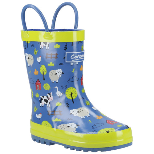 Blue children's rain boot with farm animal patterns, including sheep, cows, and chickens, surrounded by trees and barns. Bright yellow trim and handles. Fun and playful design.