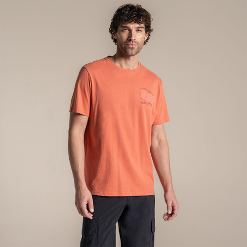 Model wearing orange Craghoppers T-shirt, front view.