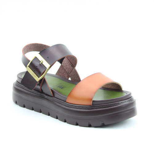 Two-tone platform sandal with a tan front strap, dark brown ankle strap with a gold buckle, and a chunky black sole on a white background.