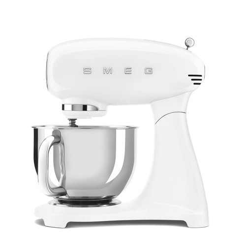 White Smeg stand mixer with stainless steel mixing bowl, side profile view on a plain background.