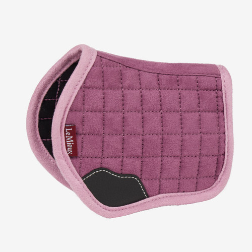 Purple equestrian saddle pad with grid stitching, black accents, and branded tag on the side. Soft texture and elegant design for horse riding.
