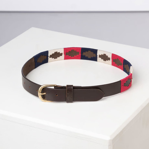 Children’s leather polo belt with red, navy and cream woven pattern and brass buckle, front view.
