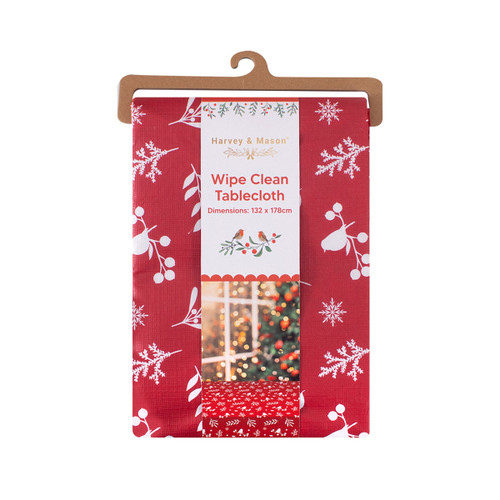 Harvey & Mason wipe clean Christmas tablecloth in retail packaging, featuring a red background with white robin, berry, snowflake and winter foliage patterns. Measures 132 x 178cm.