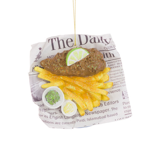 Novelty fish and chips hanging ornament featuring golden fries, battered fish with a lemon slice, and dipping sauces, presented on a newspaper-style wrapper with a glittered finish.