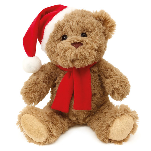 Soft brown teddy bear wearing a red Santa hat and matching red scarf, festive Christmas plush toy isolated on a light grey background.