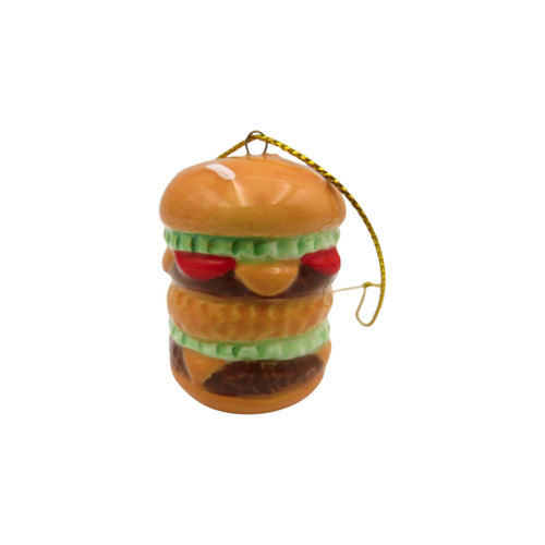 Side view of a realistic burger decoration with colourful food-inspired detailing.