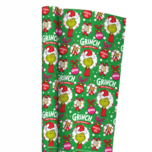 The Grinch Christmas wrapping paper featuring Grinch characters, festive baubles and holiday motifs on a green background.