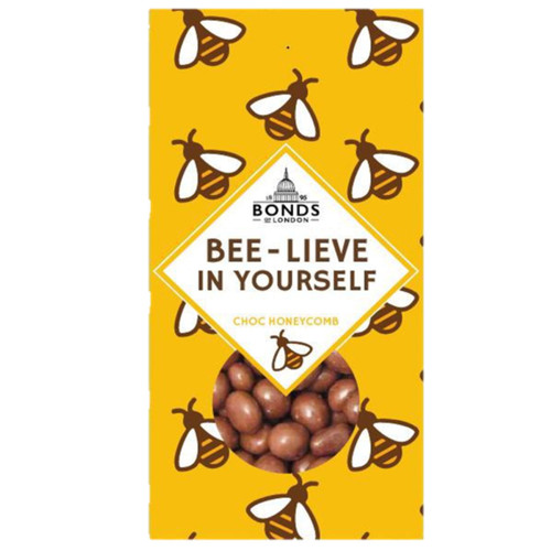 Bonds of London "Bee-lieve in Yourself" chocolate honeycomb gift box featuring milk chocolate-coated honeycomb bites in a bright yellow bee-themed presentation box with viewing window.