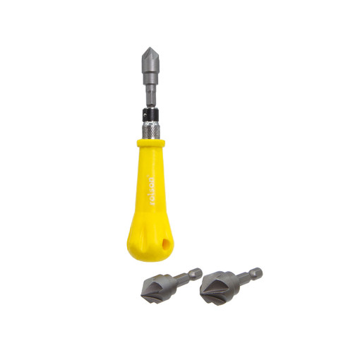 A yellow-handled screwdriver with a gray drill bit attached is placed vertically. Two additional gray drill bits lie horizontally below it.