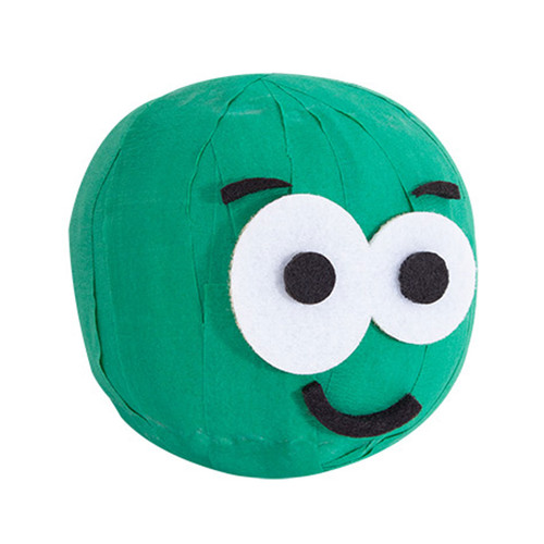 Green sprout-shaped pass the parcel game wrapped in tissue layers, featuring a smiling cartoon face with large eyes and playful expression.