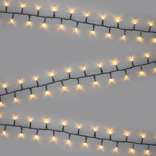 Warm white LED décor tree lights with green cable displayed in parallel strands against a light grey background, ideal for Christmas trees, festive decorations and indoor or outdoor use.