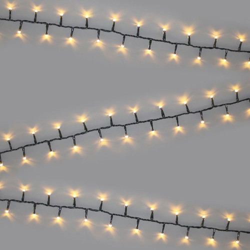 Warm white LED décor tree lights with green cable displayed in parallel strands against a light grey background, ideal for Christmas trees, festive decorations and indoor or outdoor use.