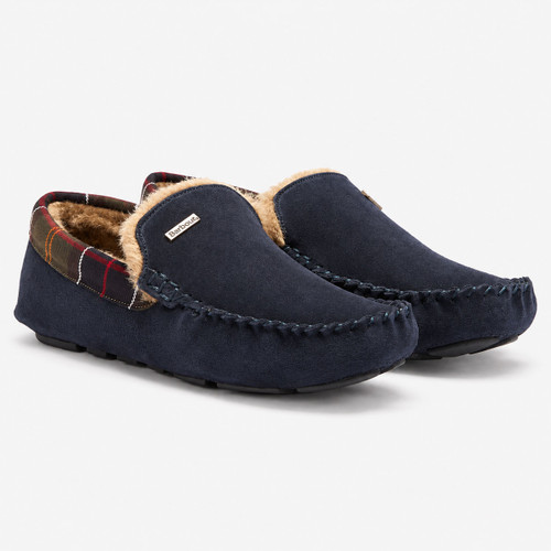 Men’s Barbour Monty Slippers in navy suede with tartan trim and faux-fur lining – angled view
