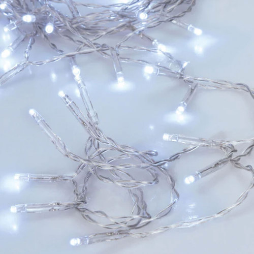 Cool white LED string lights with 20 LEDs on a clear cable, ideal for Christmas trees, festive decorations, table centrepieces and indoor ambient lighting.