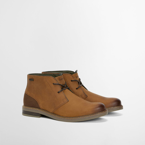 Barbour Readhead tan leather chukka boots with contrast heel panel and low stacked sole, photographed at a three-quarter angle.