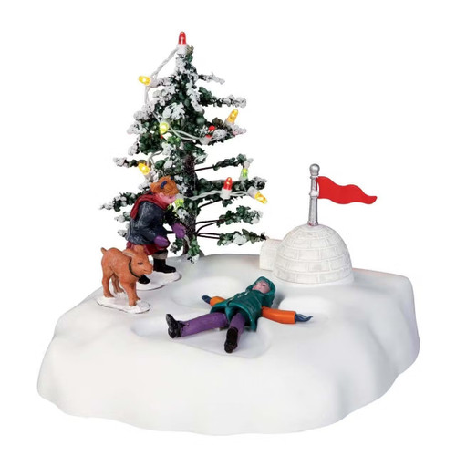 A playful winter scene featuring a decorated tree, a child lying in snow, a dog, and a small igloo with a flag.