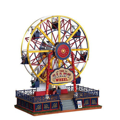 Illuminated Christmas village Ferris wheel with colourful gondolas, decorative fairground detailing and festive amusement park styling, ideal as a centrepiece for holiday village displays.