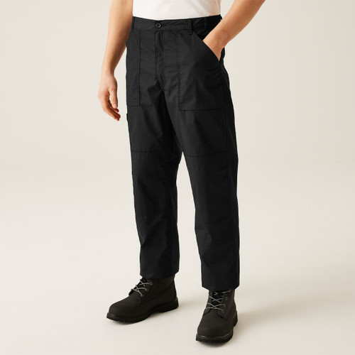 Front view of black men’s cargo work trousers worn with boots, featuring straight leg fit, button waistband, belt loops, large front patch pockets, and reinforced knee panels