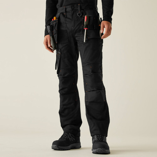Front view: Men’s black multi-pocket work trousers with tool holster pockets, heavy-duty utility pants, reinforced knees, durable construction, tradesman workwear.