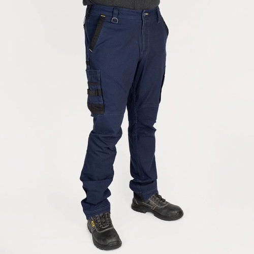 Men’s navy blue work trousers with slim fit, featuring multiple utility pockets, reinforced knee panels and worn with safety boots.