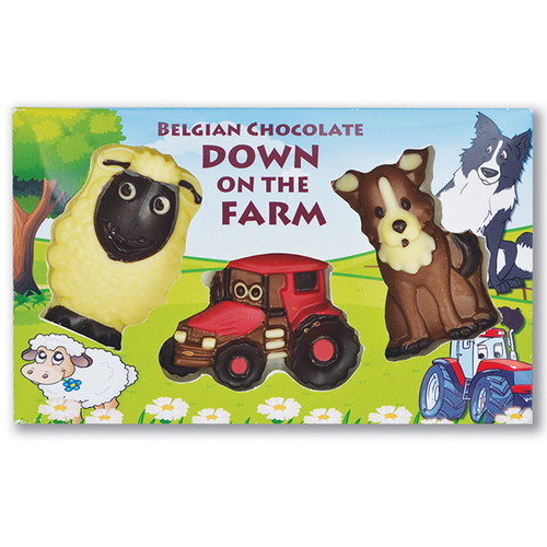 Belgian chocolate Down on the Farm gift set, featuring novelty chocolates shaped as a sheep, tractor, and sheepdog, in a colourful farm-themed box.