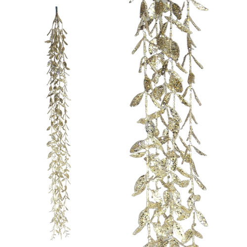 Long strands of decorative foliage with glittering gold leaves hang vertically. The design is elegant and festive, evoking a sense of luxury and celebration.