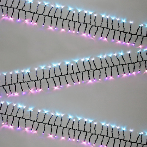 Pastel LED cluster Christmas tree lights with pink, blue and cool white LEDs on a green cable, arranged in a dense string suitable for indoor and outdoor festive displays.