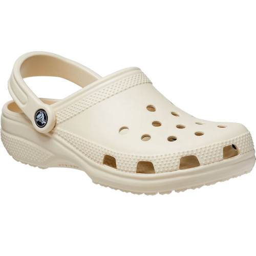 Beige slip-on clog-style shoe with ventilation holes and pivoting heel strap. Features textured details on the upper and sole for added grip. Casual and comfortable.