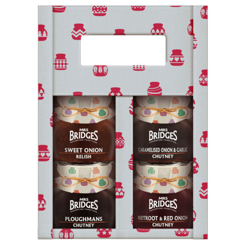 Mrs Bridges chutney and relish gift set featuring four small jars—Sweet Onion Relish, Caramelised Onion & Garlic Chutney, Ploughman’s Chutney, and Beetroot & Red Onion Chutney—presented in a grey gift bag decorated with red festive jar illustrations and a built-in carry handle.