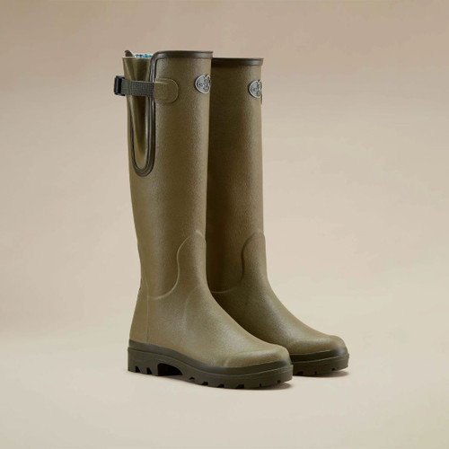 Le Chameau women’s olive green tall wellington boots with adjustable calf gussets and rugged treaded soles.