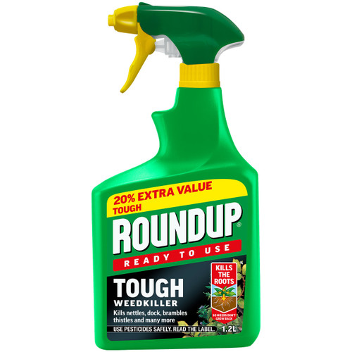 Green spray bottle of Roundup Tough Weedkiller with yellow nozzle. Label says "20% Extra Value" and "Kills the roots." Contains 1.2 litres.