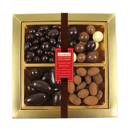 Gold box with assorted chocolates and nuts, divided into four sections. Rich tones and elegant packaging convey a luxurious and indulgent feel.
