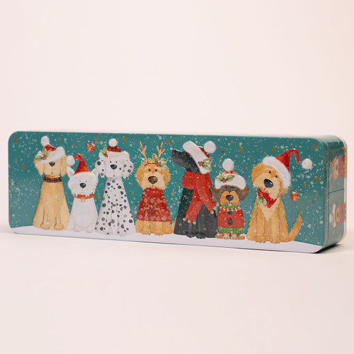Festive rectangular biscuit tin featuring illustrated dogs in Christmas outfits, hats and scarves on a teal background.