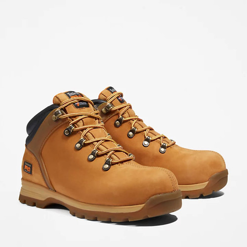 Pair of tan Timberland PRO work boots with black padded collars and gold laces, angled view.