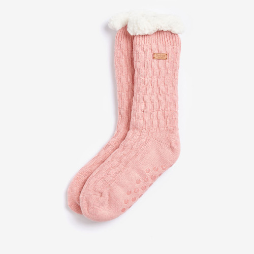 Pink knitted lounge sock with white fluffy trim and non-slip dots on the sole.