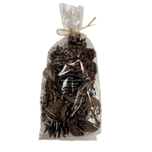 Natural pine cone potpourri mix in a clear gift bag, featuring assorted dried pine cones and decorative botanicals for festive home décor and seasonal displays.