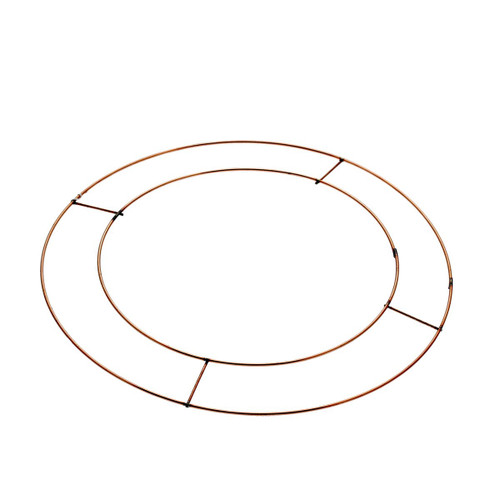 Copper wire wreath frame on a white background, featuring a circular metal ring for creating floral wreaths, seasonal decorations and DIY craft projects.