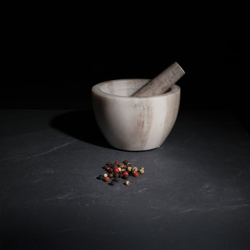 A marble mortar and pestle.