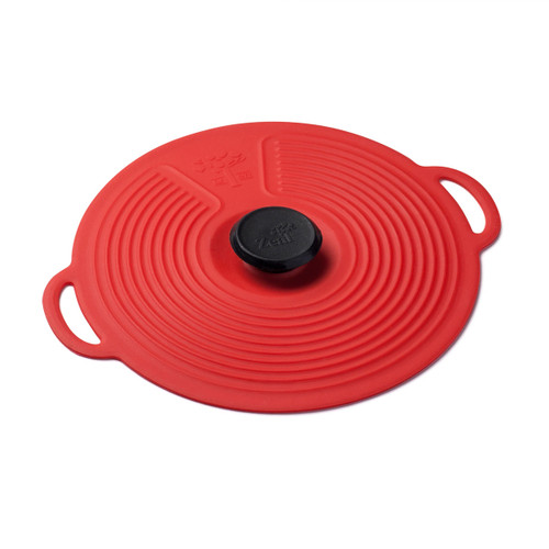 Red silicone lid with concentric circles and a black knob on a white background.